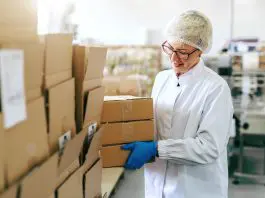 worker lifting heavy box