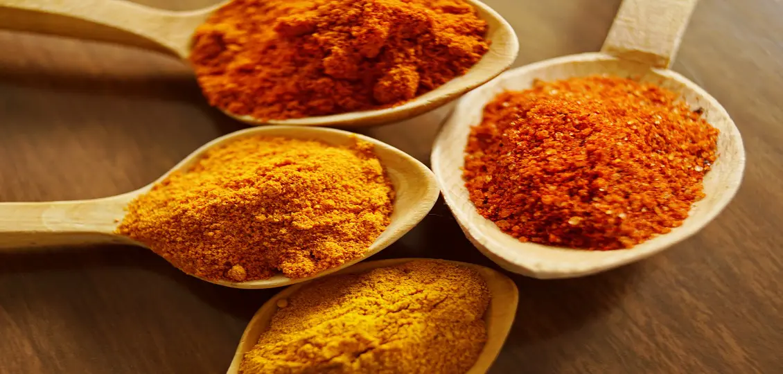 four-assorted-spices-on-wooden-spoons-1340116