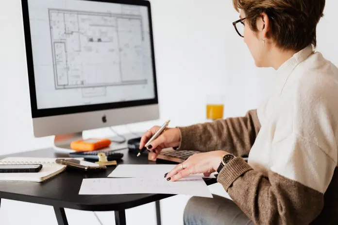 HRHQ Menopausal woman menopausal woman working at desk