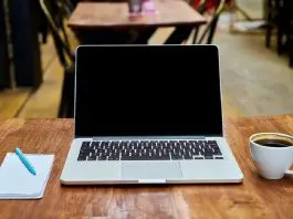open laptop of hybrid worker