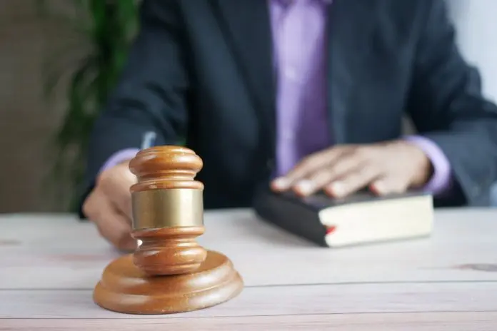 HRHQ WRC judge judge with gavel in hand