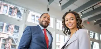 woman and man dressed in impressive suits