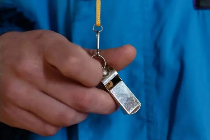 HRHQ Whistleblower man holding whistle