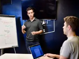 teacher in class with student