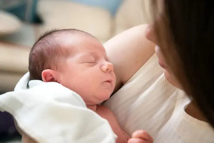 mother and new born baby