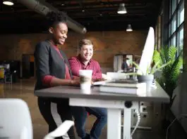 colleagues in office having conversation