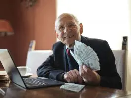 boss with hand full of cash handing to you