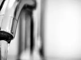 tap faucet close up with water coming out