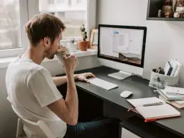 remote worker sitting at work station