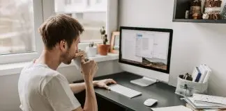 remote worker sitting at work station