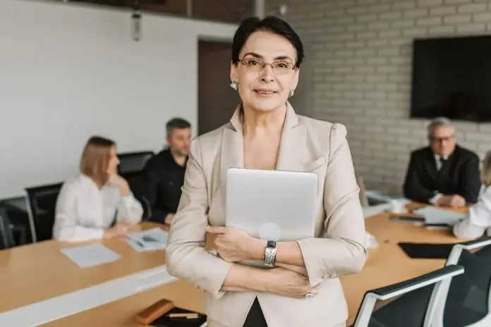 HRHQ Menopause in the Workplace woman in an office