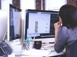 woman working in office on computer