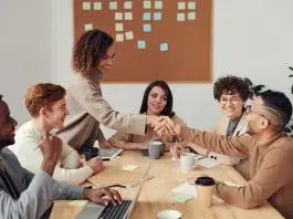 group of employees at productivity meeting
