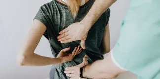patient being examined for back problems