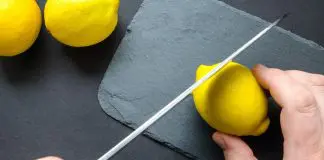 small part of lemon being cut off