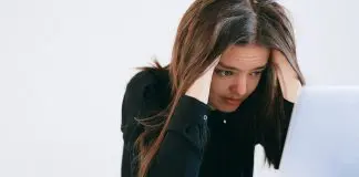stressed employee at laptop