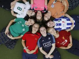 employees in team jerseys