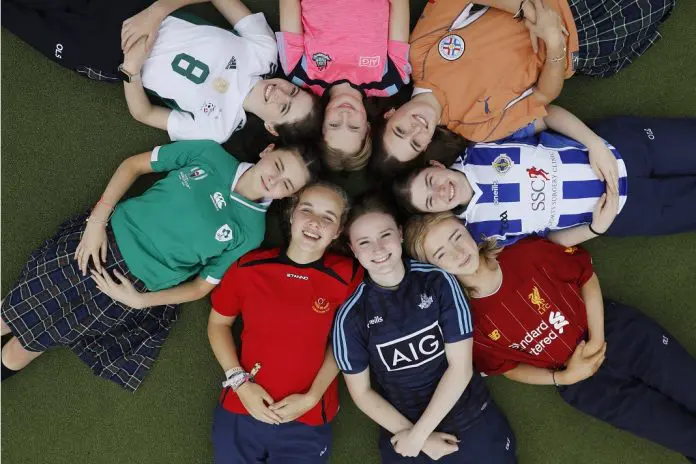 HRHQ GOAL Jersey Day employees in team jerseys