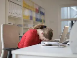 office worker asleep at desk