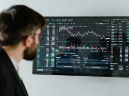 Entrepreneur looking at downward graph
