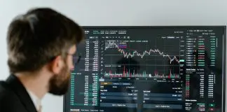 Entrepreneur looking at downward graph