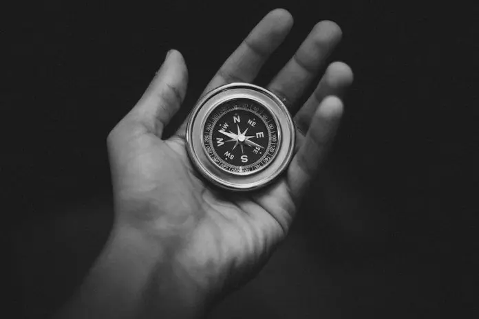 pexels-bakr-magrabi-3203659 compass in palm of hand