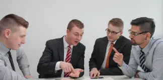 a meeting listening to complaints