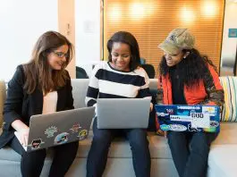 3 employees discussing benefits
