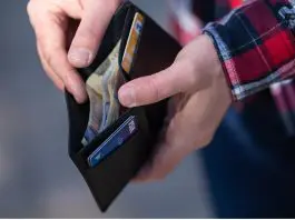 man checking wallet