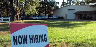 Hiring sign outside factory