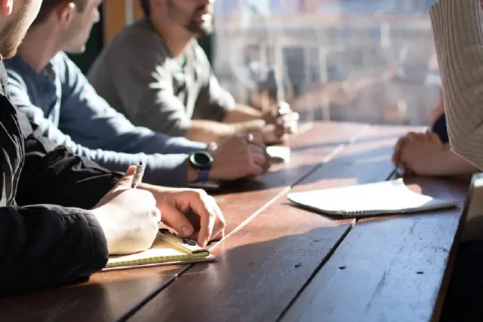 Irish working life in 2022 group of workers at meeting