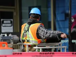 Construction worker in full Health & Safety regulation equipment
