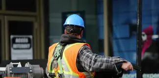 Construction worker in full Health & Safety regulation equipment