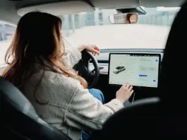 woman driving company car
