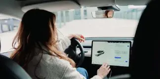 woman driving company car