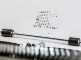 old style typewriter with "thank you" typed in several languages