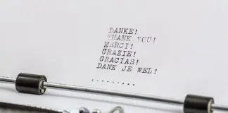 old style typewriter with "thank you" typed in several languages