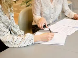 employee signing employment contract