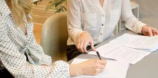 employee signing employment contract