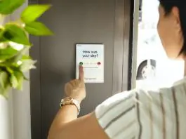 employee compelting digital "how was your day?" survey
