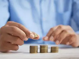 Man counting euro coins.