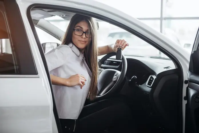 employee in company car