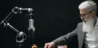 Man playing chess with computer