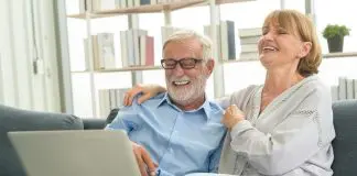 Pensioner viewing laptop