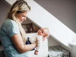 Mother nursing new born baby