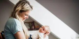 Mother nursing new born baby