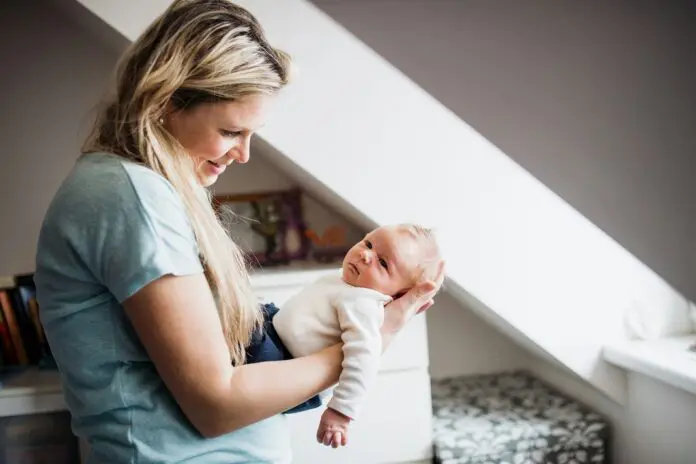 HRHQ Maternity Leave Protection Mother nursing new born baby