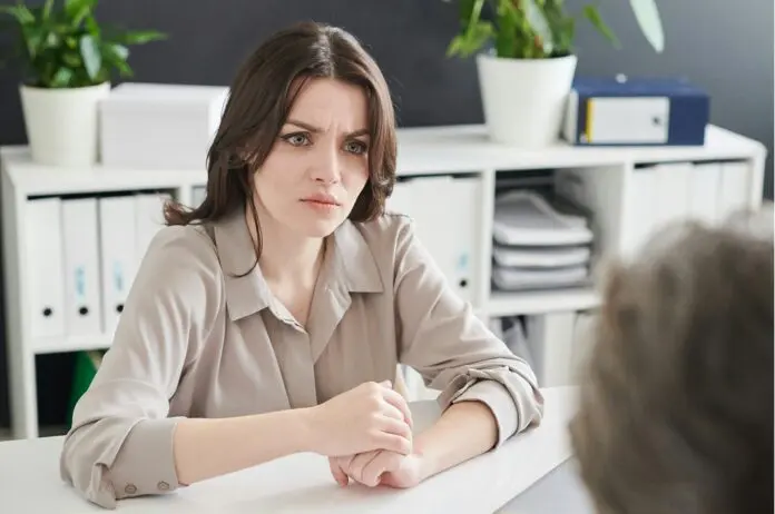 Employee in redundancy meeting