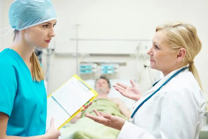 HRHQ Nursing in Ireland Irish doctor in discussion with nurse