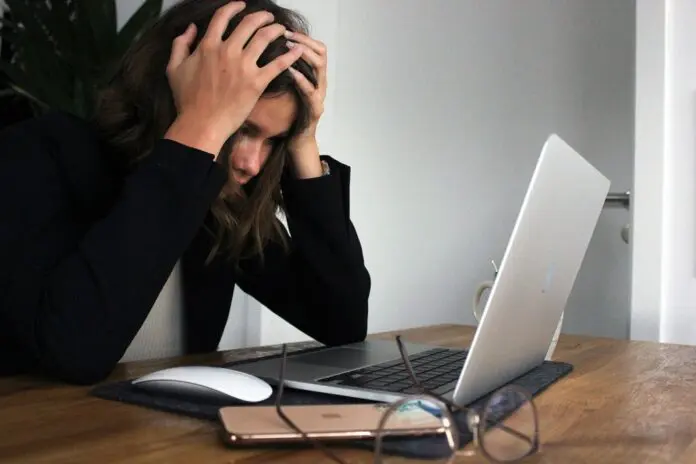 stressed employee at desk